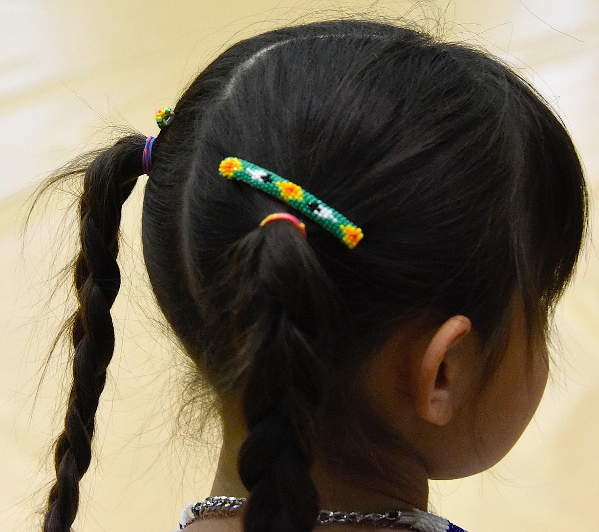 Everybody wore their regalia at the Head Start Powwow, including this youngster who had beaded barrettes. (Berl Tiskus/Leader)