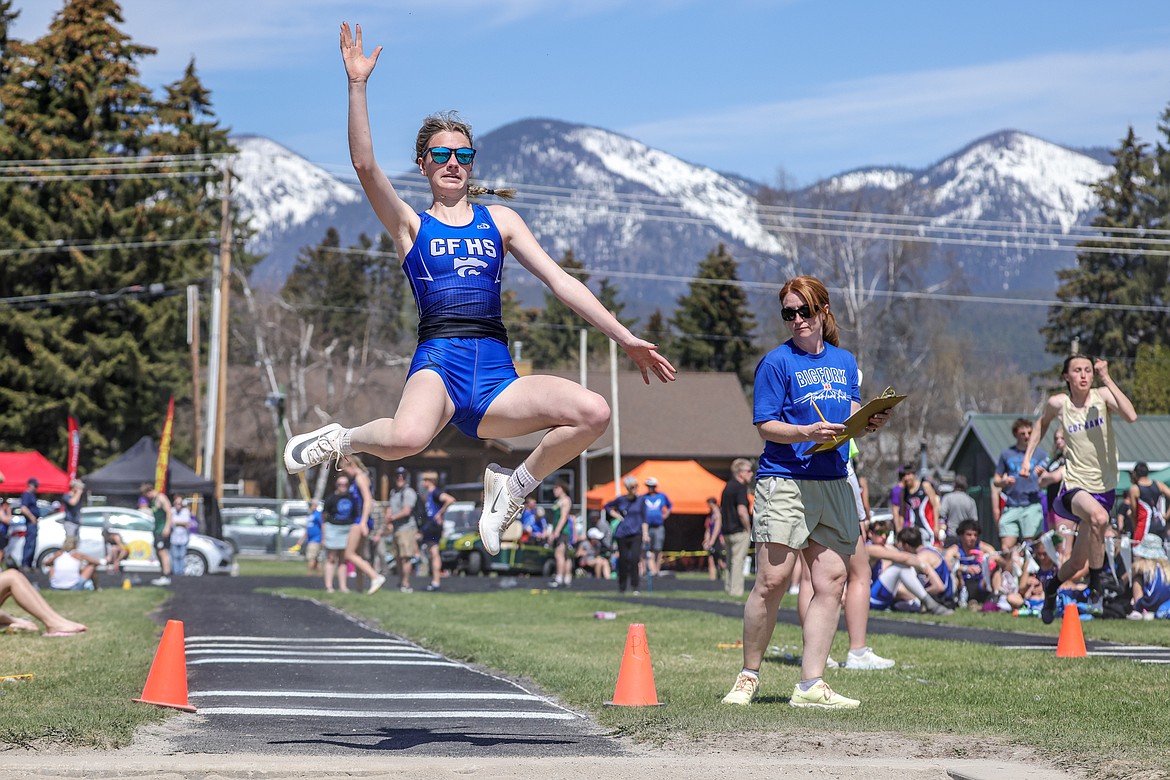 Taryn Borgen jumps in the long jump at the Whitefish A.R.M, meet in Whitefish on Saturday. (JP Edge photo)
