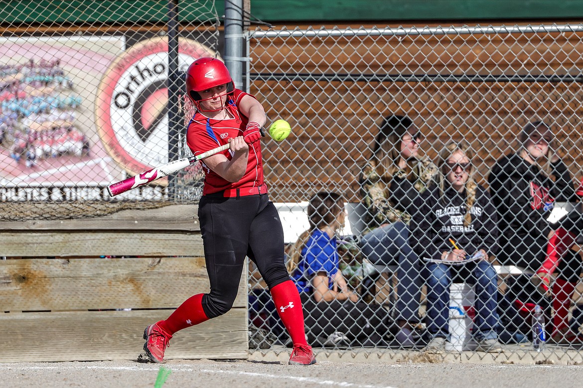 Junior Demye Rensel hits a home run against the Bulldogs in Whitefish on Thursday. (JP Edge photo)