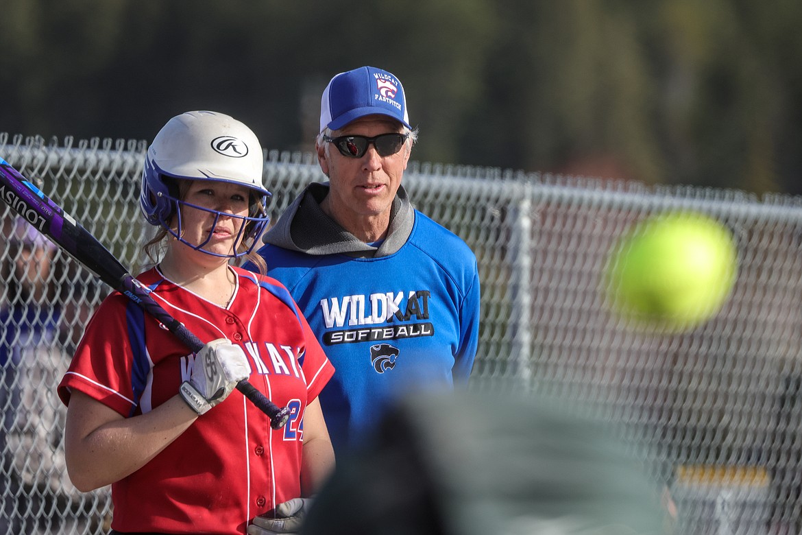 Head coach for the Wildkats Dave Kehr chats with senior Kyrah Trenkle in Whitefish on Thursday. (JP Edge photo)