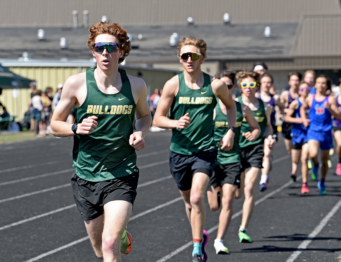 Nate Ingelfinger leads a pack of Bulldogs in the first lap of the men's 1600 meter event at the Whitefish A.R.M. on Saturday. (Whitney England/Whitefish Pilot)