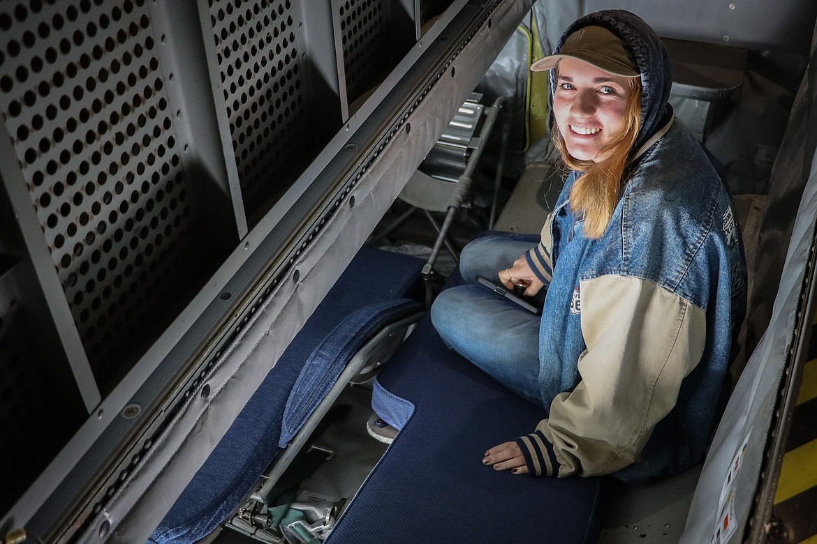 Lakeland High School senior Katrina Evans explores an Air National Guard plane during a flight over Oregon, Washington and Idaho April 26. She is enlisted in the Army Reserves, where she plans to be an aircraft mechanic after she graduates.