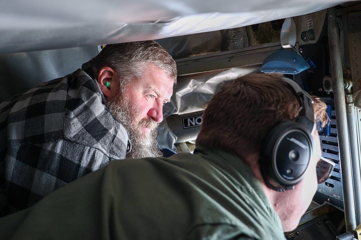 Instructors were excited "Like little kids" when they were invited on a refueling flight through the Air National Guard, in what was a once in a lifetime opportunity for many of them. Corey Pettit is enthralled by the view, and the chance to have full range of the KC-135 plane.