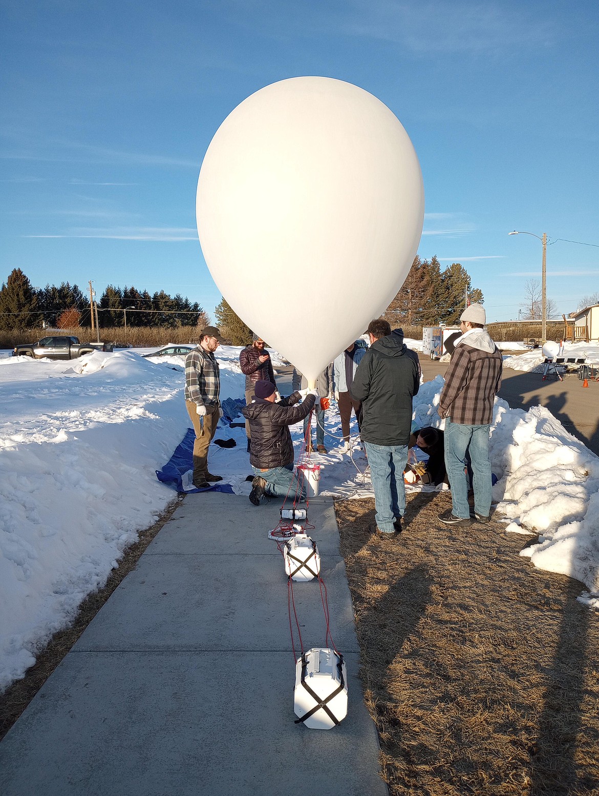 Photo of the first balloon launch in Bozeman for Montana State University in 2023. (Photo courtesy of Isaac O'Rourke.)
