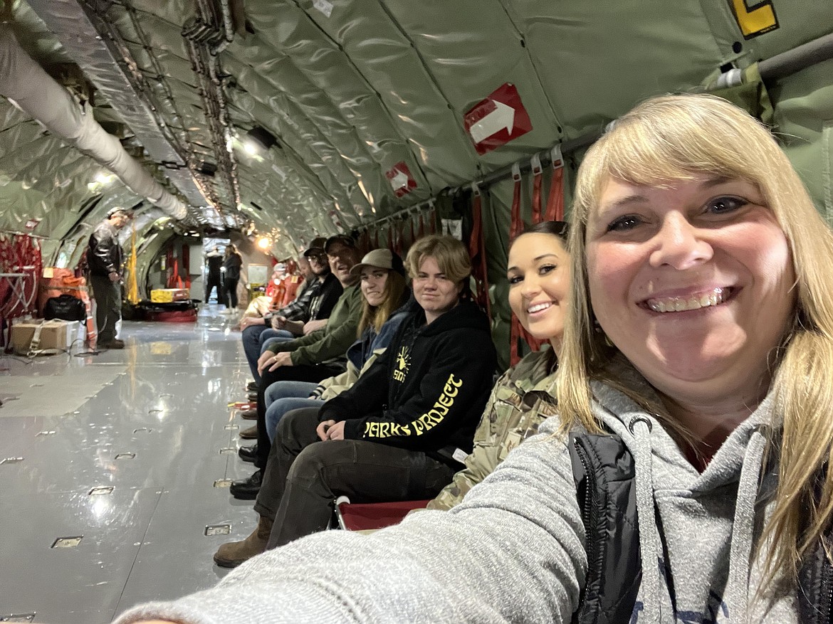 From right, Lakeland High School's career advisor Carrie Paquette, Air National Guard recruiter Emily Hanson, senior Ty Gilbert, senior Katrina Evans, student resource officer John Hatcher, junior Brent Hill and instructor Corey Pettit are guests on an Air National Guard refueling flight April 26.