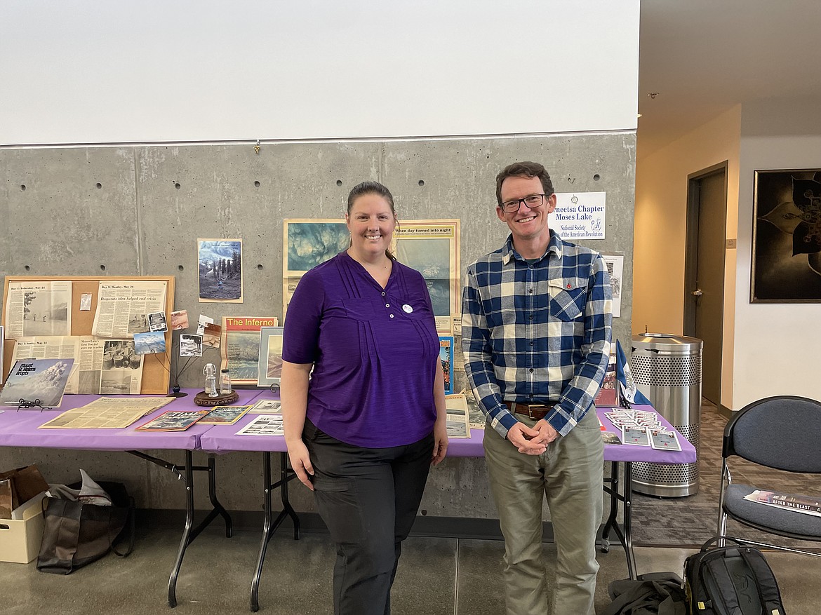 Stephanie Massart, left, regent of the Karneetsa Chapter of the National Society of the Daughters of the American Revolution, with biologist and author Eric Wagner in the lobby of the Moses Lake Civic Center. On Saturday, Wagner spoke about the surprising nature of the environmental recovery around Mt. St. Helens following the volcano’s eruption on May 18, 1980.