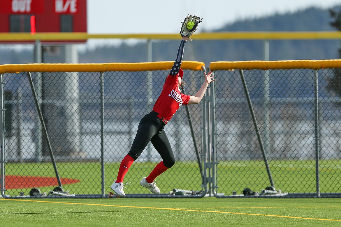 Cadence Skibitsky makes a leaping grab in center field.