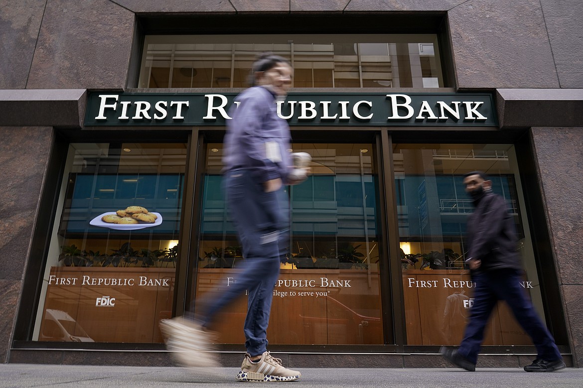 Pedestrians walk past the headquarters of First Republic Bank in San Francisco, Monday, May 1, 2023. The Fed's interest rate decision, announced on Wednesday, comes against the backdrop of both still-high inflation and the persistent turmoil in the banking industry. (AP Photo/Godofredo A. Vásquez)