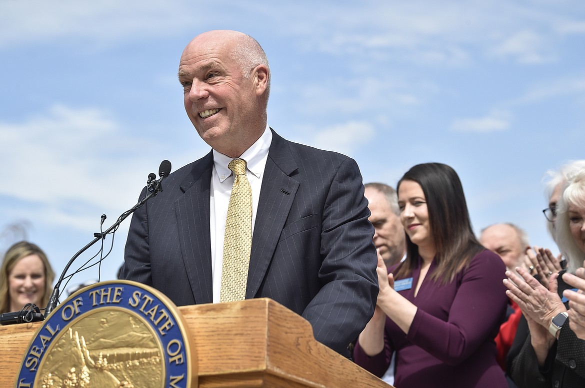 Gov. Greg Gianforte speaks at a bill signing ceremony on the steps of the State Capitol on Wednesday, May 3, 2023, in Helena, Mont. Montana's Republican-controlled Legislature passed several bills related to abortion access, and Republican Gov. Gianforte signed five of them Wednesday, including one that will likely lead the state Supreme Court to reconsider its nearly 25-year-old decision that supports the right to a pre-viability abortion by a provider of the patient's choice. (Thom Bridge/Independent Record via AP)