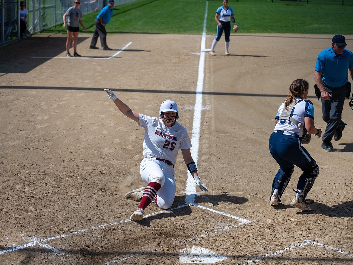 Photo courtesy of NORTH IDAHO COLLEGE
North Idaho College sophomore Megan Dobrev slides into home in the bottom of the first inning of the first game of Wednesday's Northwest Athletic Conference doubleheader at Memorial Field.