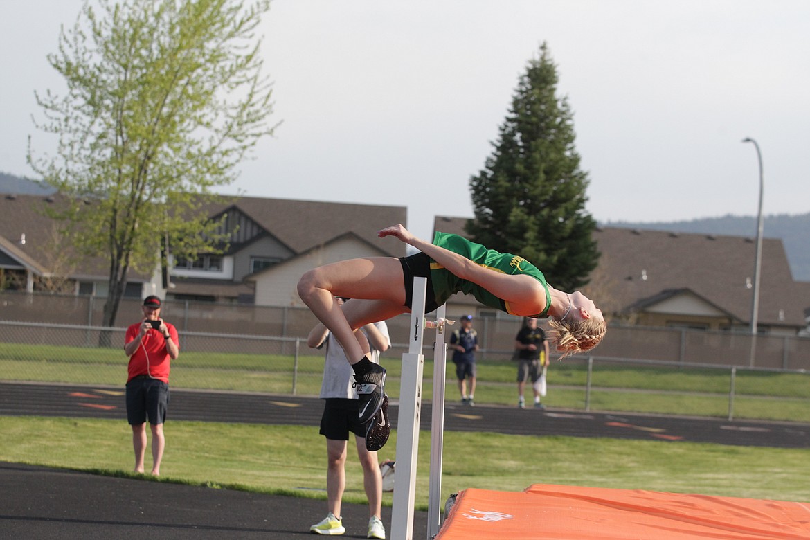 JASON ELLIOTT/Press
Lakeland senior Kenna Simon attempts to clear the bar during an attempt during the girls high jump. Simon, the defending state 4A champion, won the event with a jump of 6-feet.