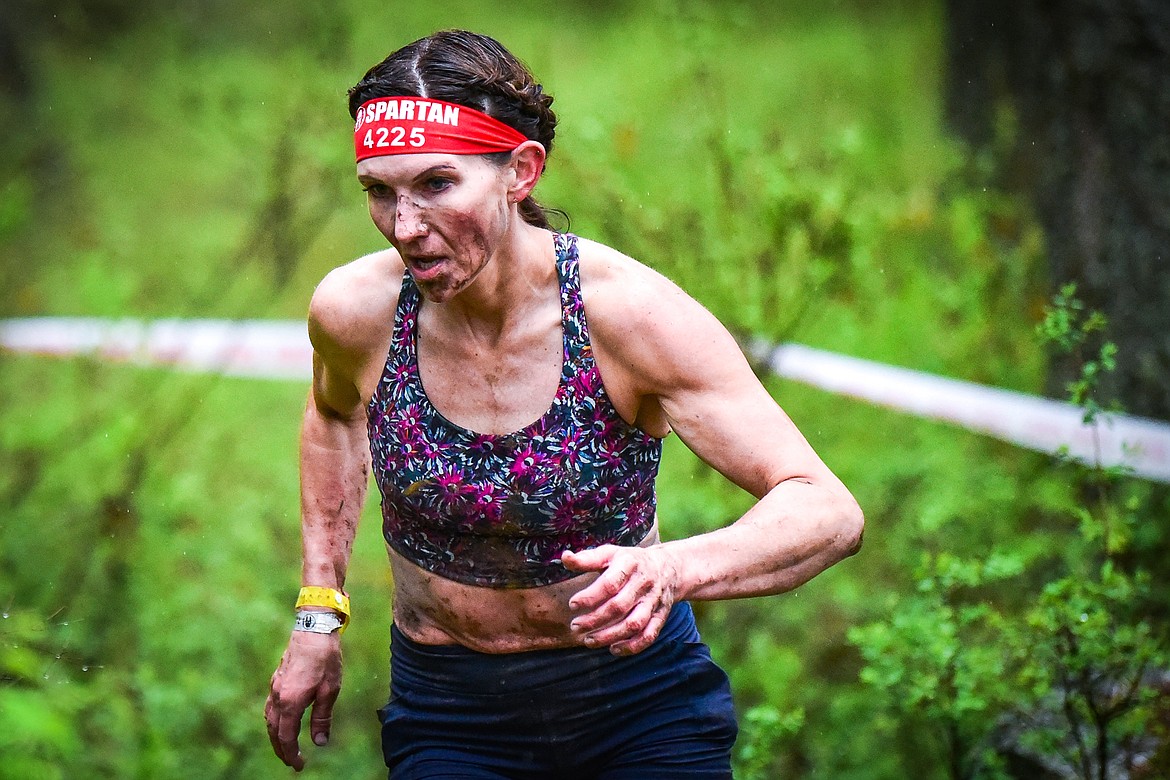Lacey Bourgois, from Colorado Springs, Colorado, runs through the course at the Montana Spartan Trifecta in Bigfork on Saturday, May 6. (Casey Kreider/Daily Inter Lake)