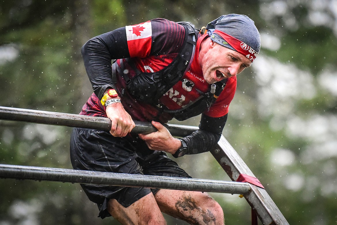A competitor navigates over the bender obstacle at the Montana Spartan Trifecta in Bigfork on Saturday, May 6. (Casey Kreider/Daily Inter Lake)