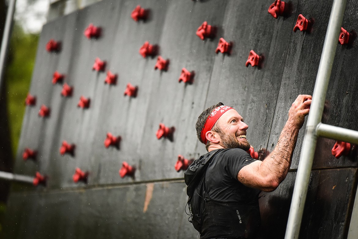 A competitor climbs the Stairway to Sparta obstacle at the Montana Spartan Trifecta in Bigfork on Saturday, May 6. (Casey Kreider/Daily Inter Lake)