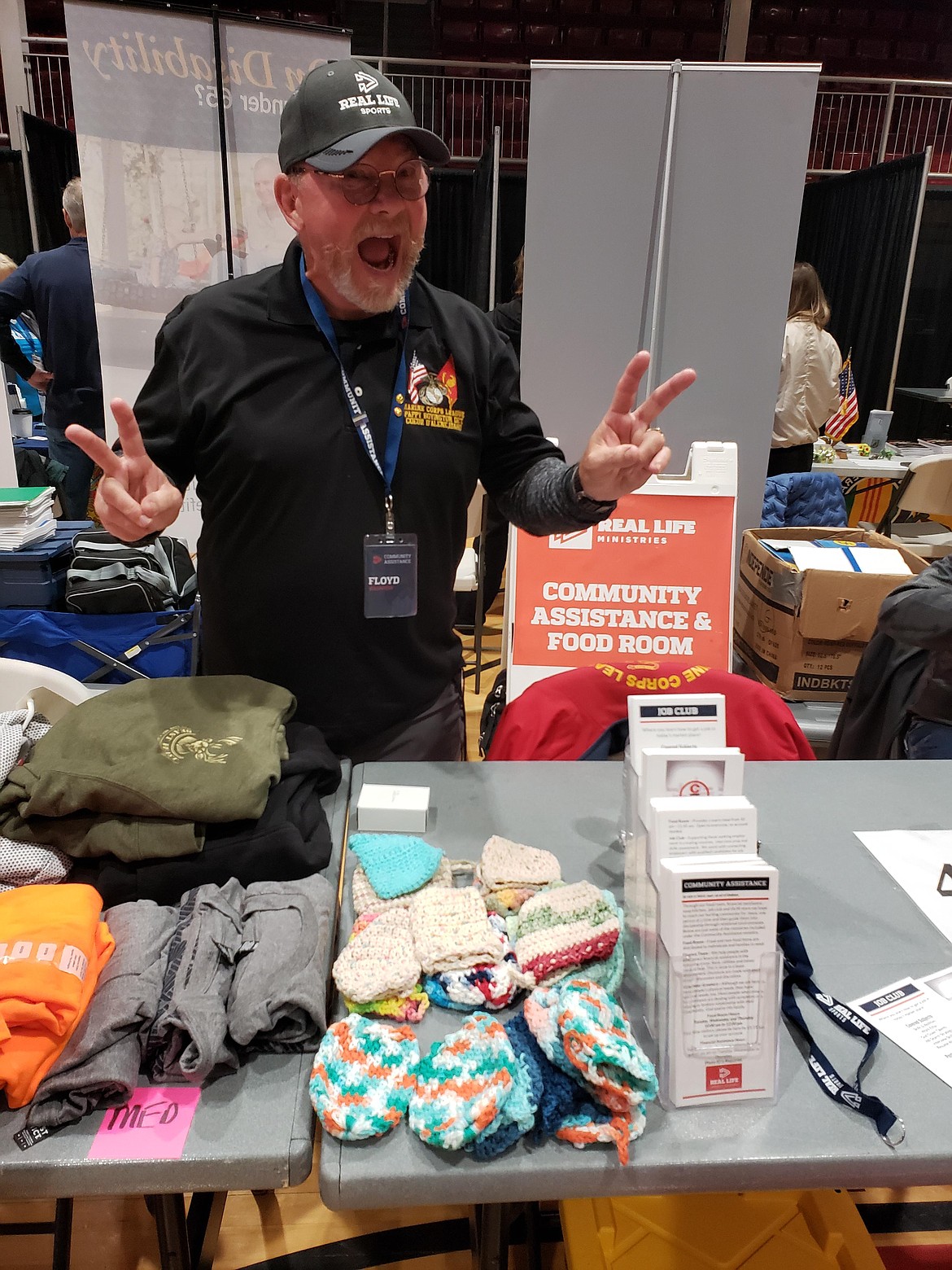 Retired Army veteran Floyd Dugger hands out hand-crocheted soap sacks to prevent falls in the shower with Real Life Ministries at the North Idaho Veterans Stand Down on Saturday. Dugger also provides information for soup kitchens and job fairs through the church to nearly 400 veterans.