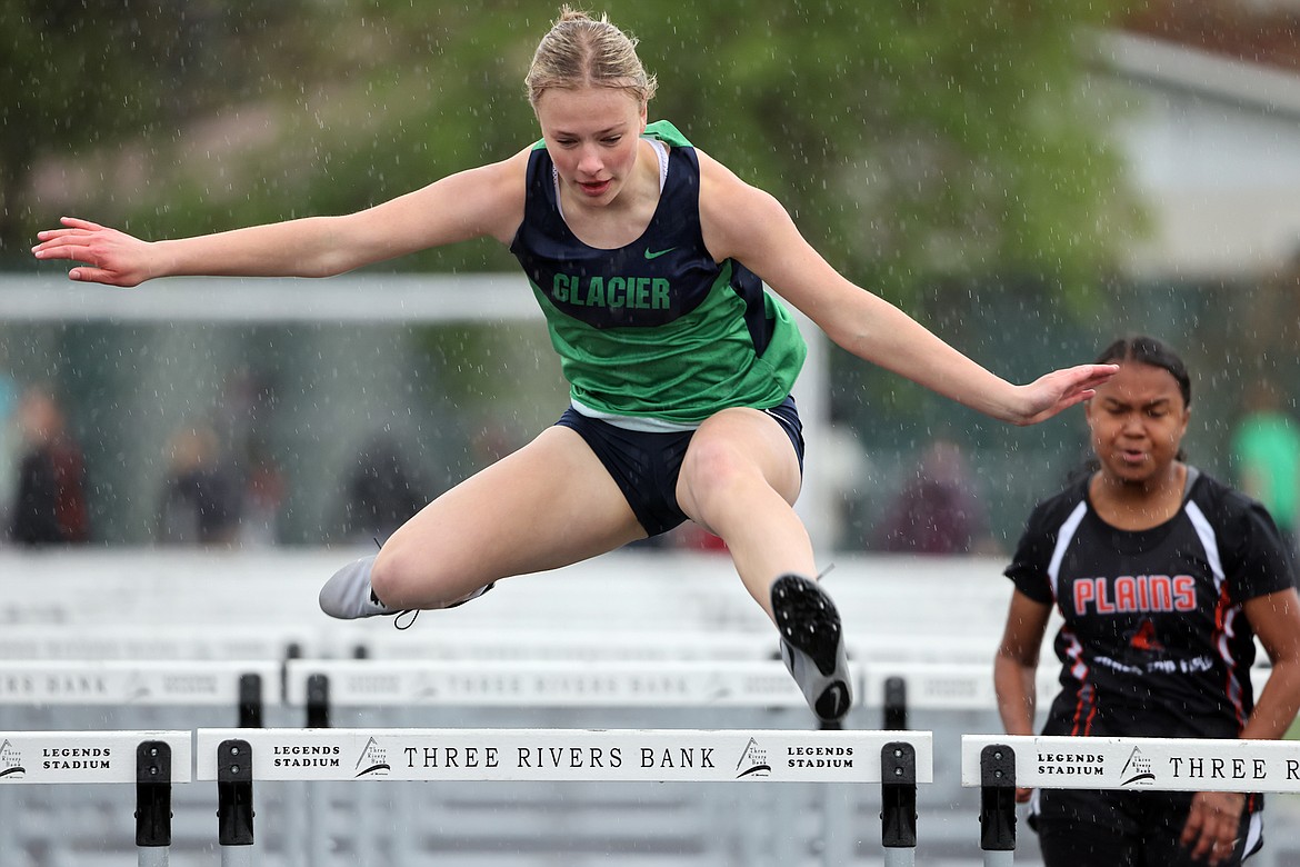 Glacier’s Emmery Schmidt competes in the 100-meter hurdles at the 44th Archie Roe Invitational at Legends Stadium on Saturday, May 5. (Jeremy Weber/Daily Inter Lake)