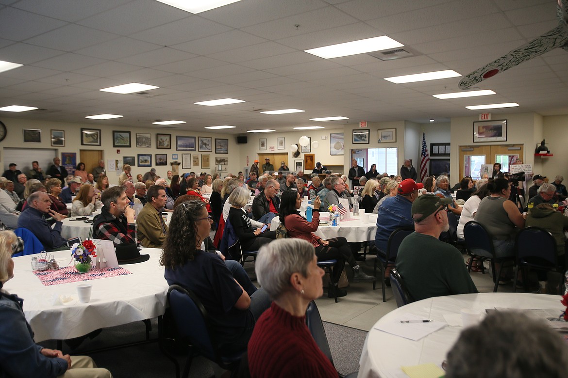 People intently listen to participants of the Community Library Network trustee town hall Saturday at the Post Falls American Legion. The event was hosted by the League of Women Voters of Kootenai County.