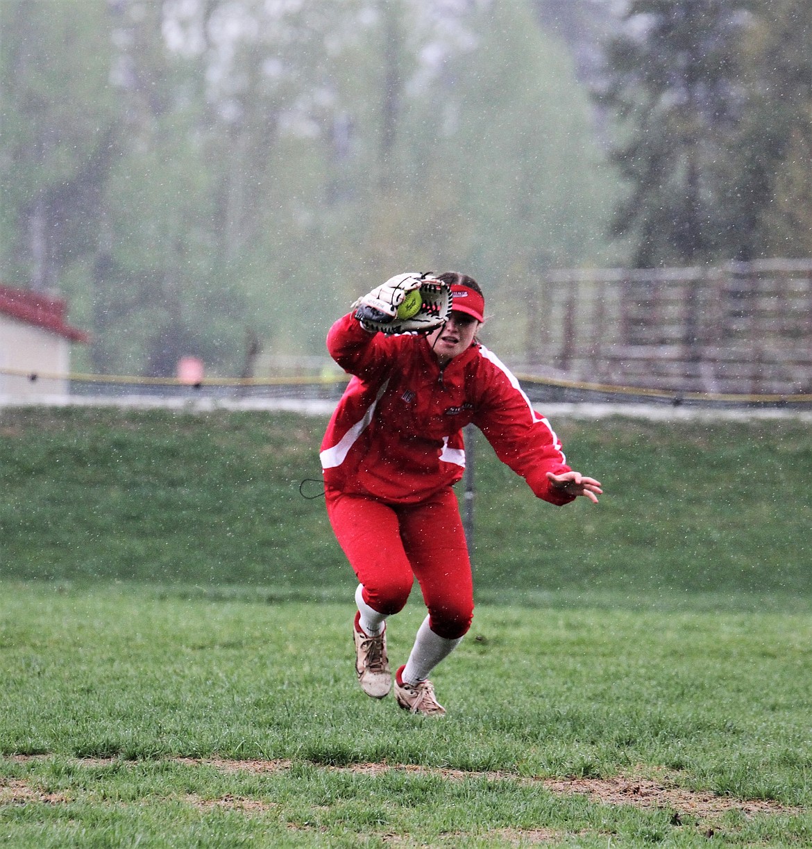 Cadence Skibitsky make a diving catch in center field.