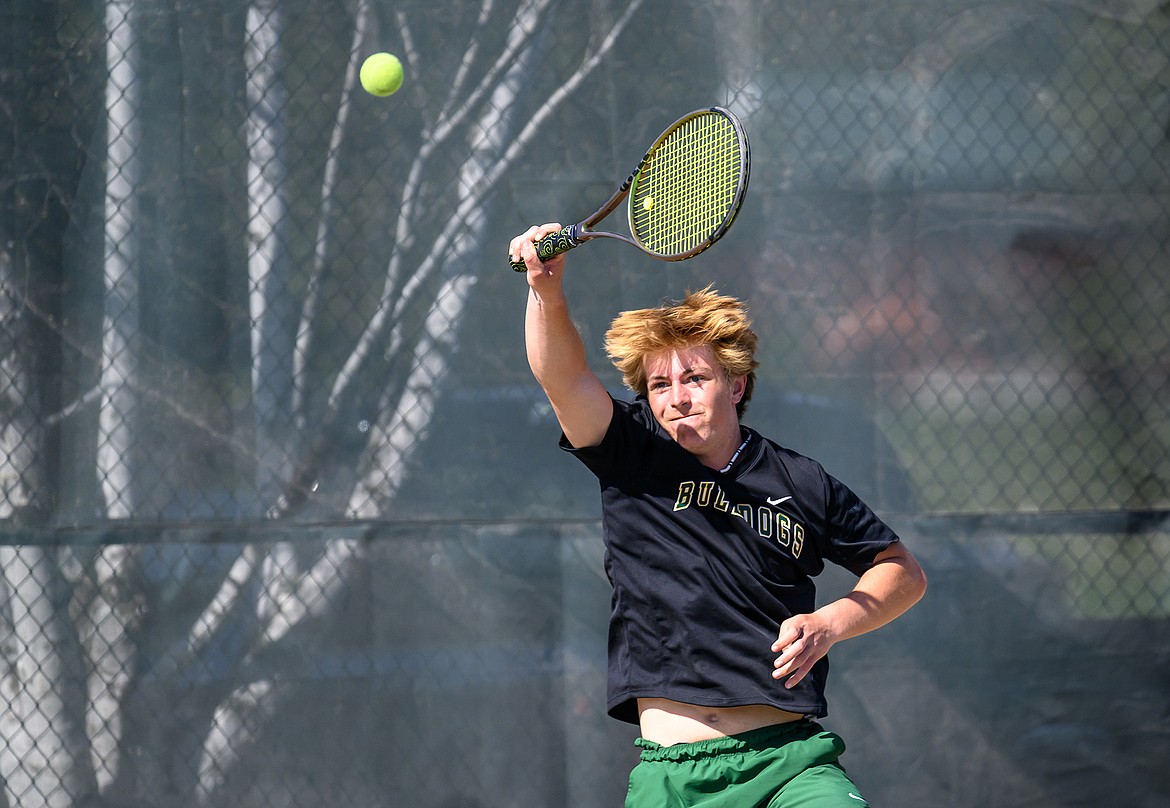 Bulldog Dane Hunt plays in the No. 1 doubles match against Columbia Falls on Tuesday, May 2 in Whitefish. (Chris Peterson photo)