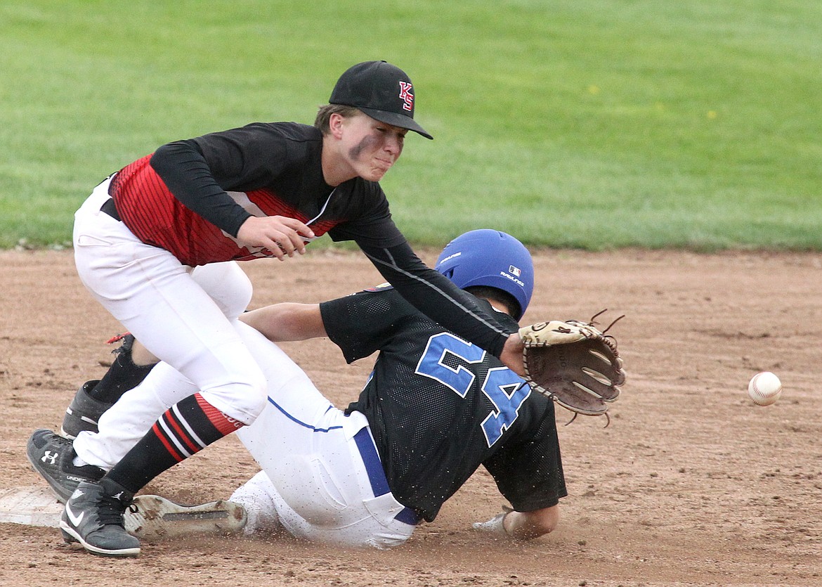 Libby Logger Isaac Lamere steals second on a late throw to Kalispell Sluggers second baseman Bransen Holzer on the 0-1 pitch in the bottom of the fourth inning. The Loggers won 10-5. (Paul Sievers/The Western News)
