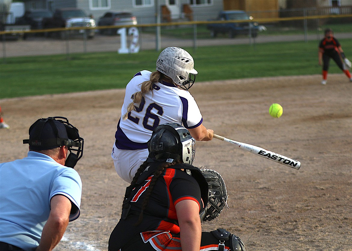 Polson's Avery Starr launches a home run in last week's victory over Ronan. (Bob Gunderson photo)