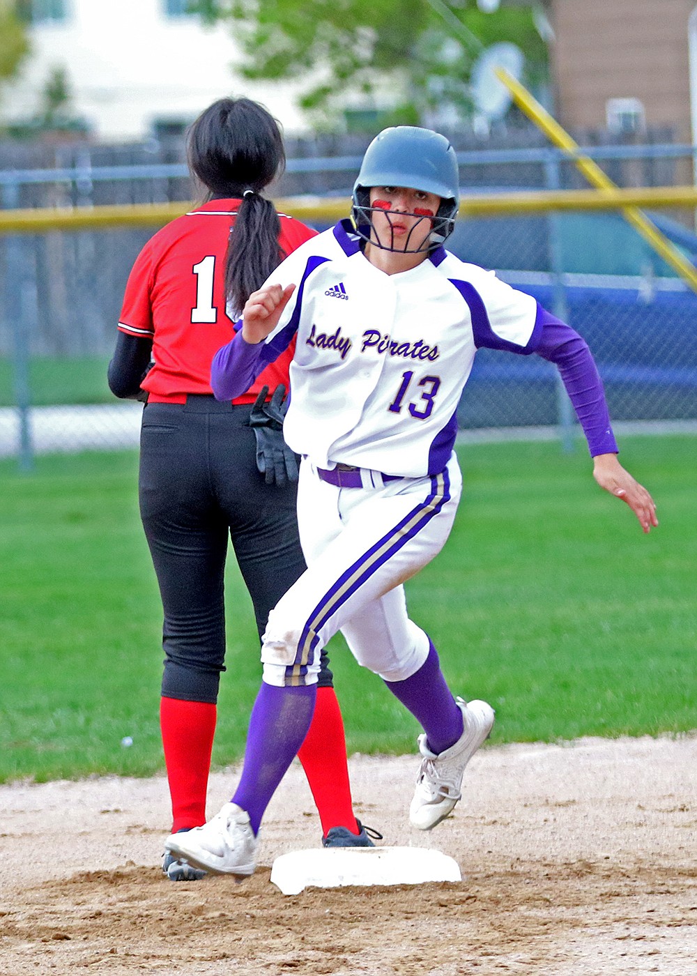 Nikki Kendall sprints for third during Polson's softball game against Browning. (Bob Gunderson photo)