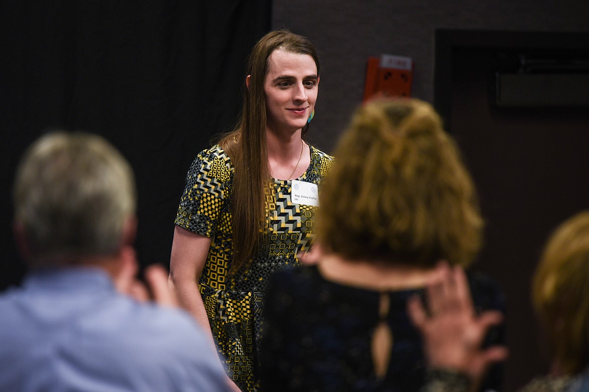 Rep. Zooey Zephyr, a Democrat from Missoula, receives a standing ovation during an event for the Flathead Democrats. Zephyr, the first openly transgender woman in the Montana legislature, was barred from the House floor during the 2023 Legislative session, making national news. (Kate Heston/Daily Inter Lake)