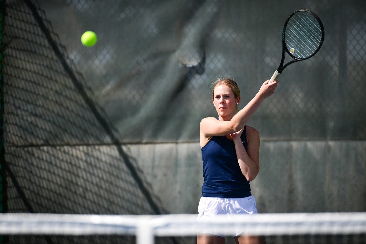 Glacier's Sarah Downs hits a return in a girls doubles match with teammate Haven Speer against Flathead's Clara Jones and Emmary Faerber at FVCC on Tuesday, May 9. (Casey Kreider/Daily Inter Lake)