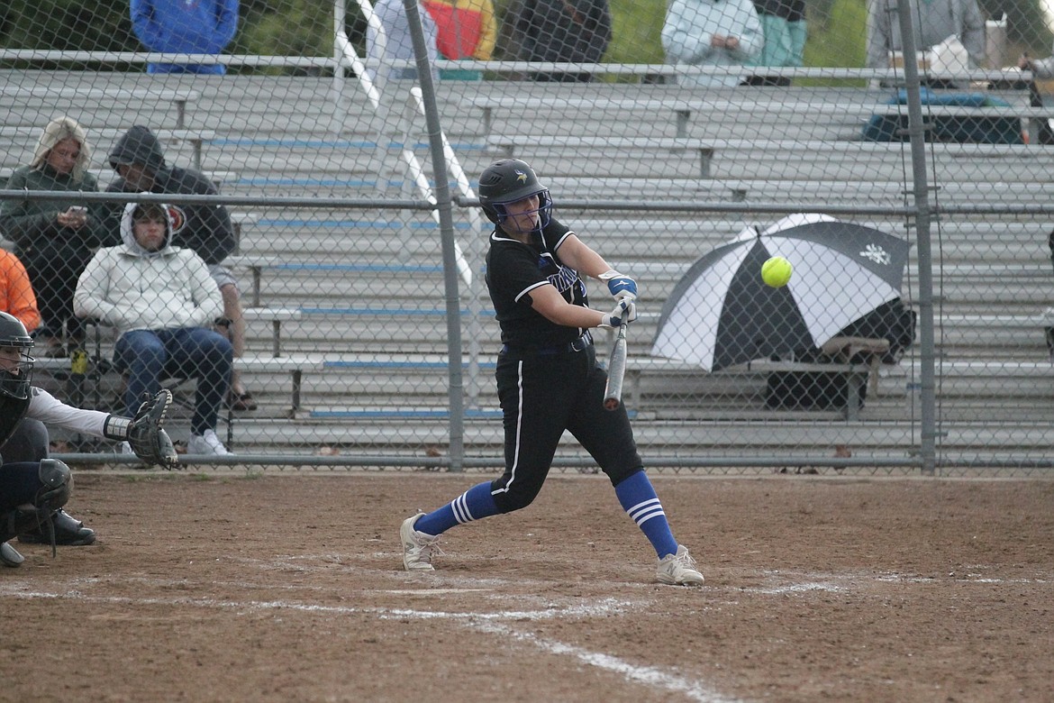 MARK NELKE/Press
Coeur d'Alene High senior Catherine Bakken hit the game-winning home run earlier Tuesday vs. Post Falls, and finished 5 for 9 as the Vikings won the 5A Region 1 softball title with a win over Lake City.