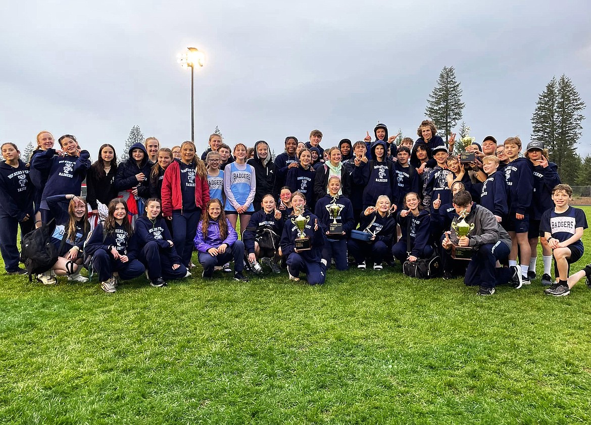 BCMS track and field teams pose with trophies after Districts on May 5.