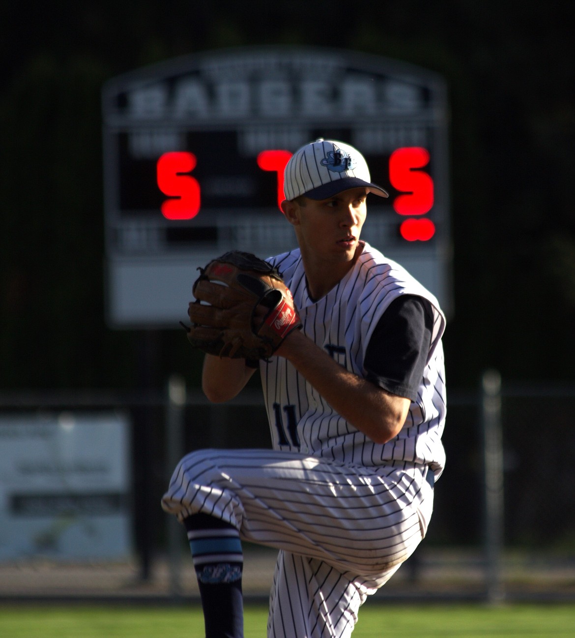 Roger Naylor pitches for the Badgers in the seventh inning tied 5 all for the 3A IML Districts Game One.