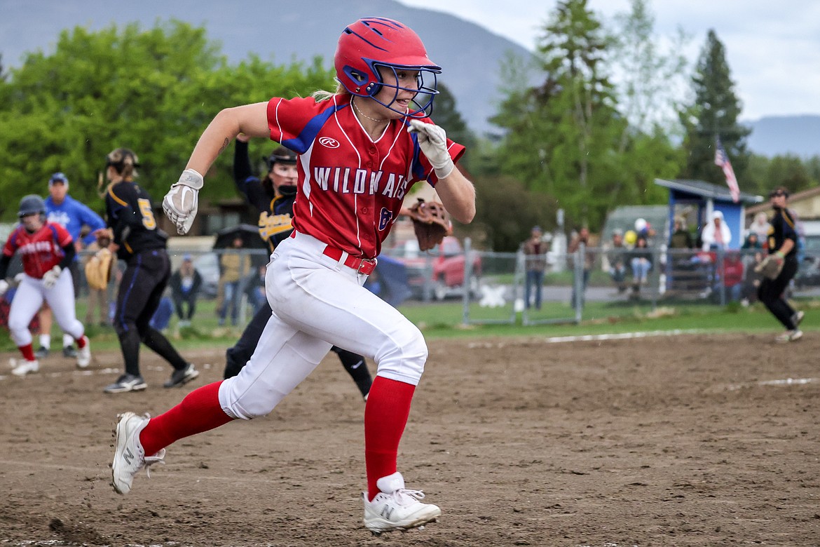 Tayler Lingle runs to first on a base hit at home on Friday. (JP Edge photo)