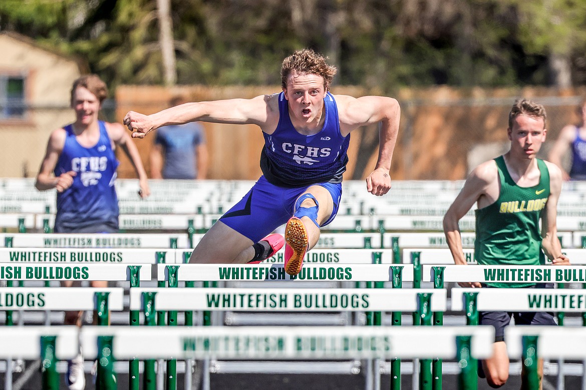 Adam Schrader competes in the 110 hurdles in Whitefish on Tuesday. (JP Edge photo)
