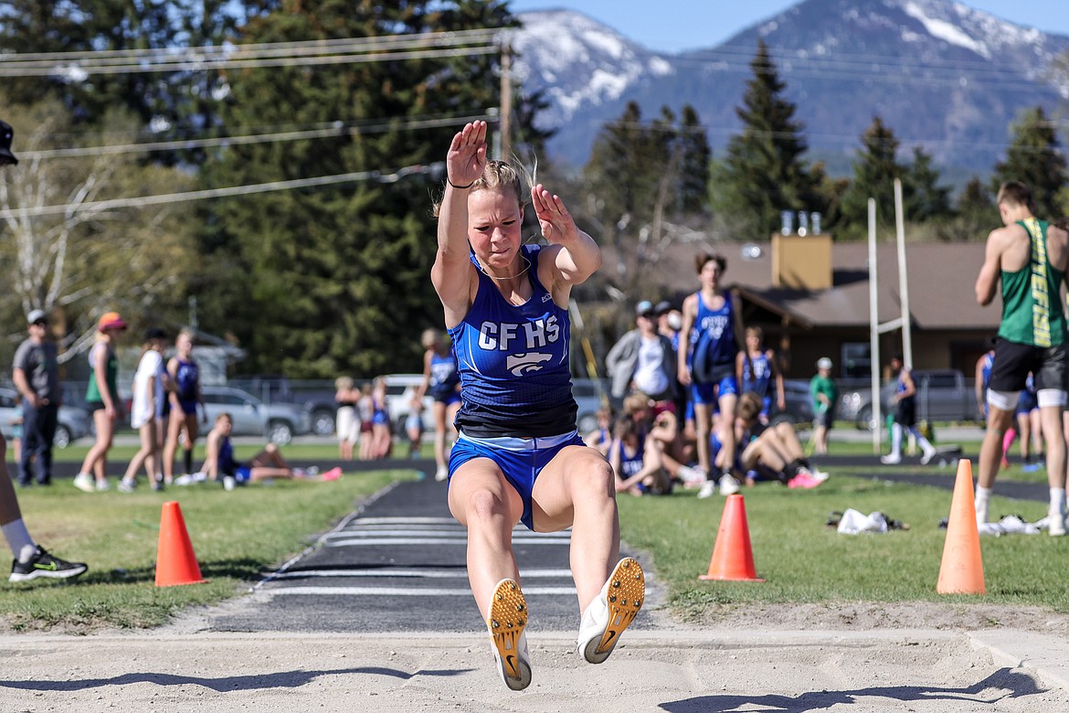 Courtney Hussion competes in the long jump at the Cat-Dog meet on Tuesday. (JP Edge photo)