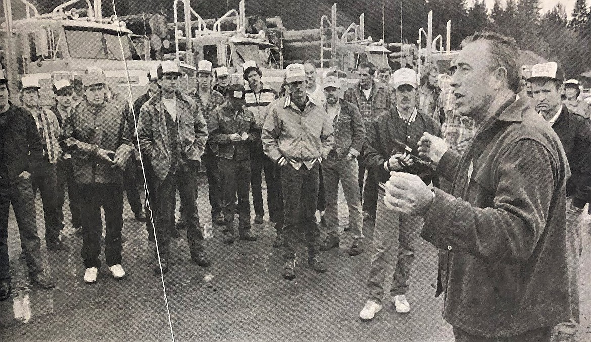 Jack Buell, of Jack Buell Trucking in St. Maries, instructs truckers prior to "The Great Northwest Log Haul."