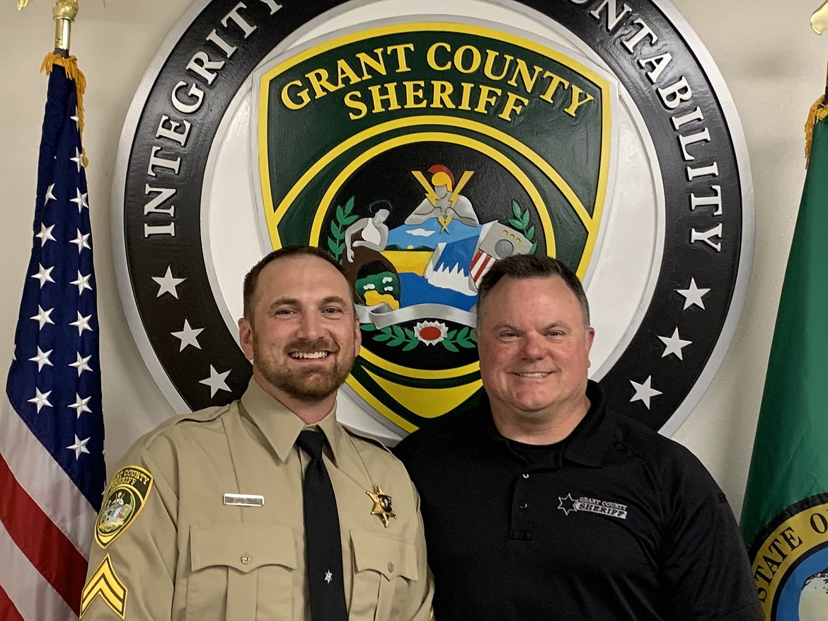 Grant County Sheriff Joe Kriete, right, administered the oath of office to newly-promoted Corporal Josh Fitzhugh last week. Fitzhugh was recognized for his efforts to be a mentor to teammates within the Grant County Sheriff's Office in a GCSO statement announcing the promotion.