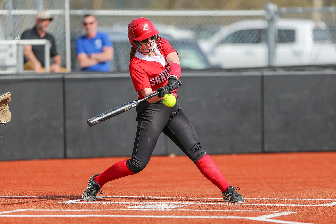 Ashlyn Darling hits a line drive in game against Coeur d'Alene earlier this year.