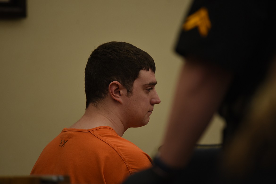 Zackary Matthew Maas, 26, sits at the defendant's table during his sentencing in Flathead County District Court on Thursday, May 11. A jury found Maas guilty of deliberate homicide in March. (Derrick Perkins/Daily Inter Lake)