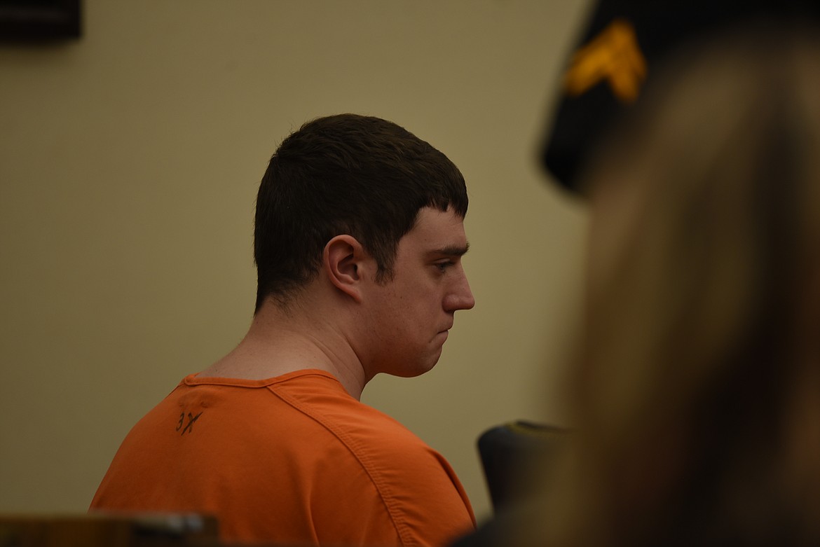 Zackary Matthew Maas, 26, sits at the defendant's table during his sentencing in Flathead County District Court on Thursday, May 11. A jury found Maas guilty of deliberate homicide in March. (Derrick Perkins/Daily Inter Lake)