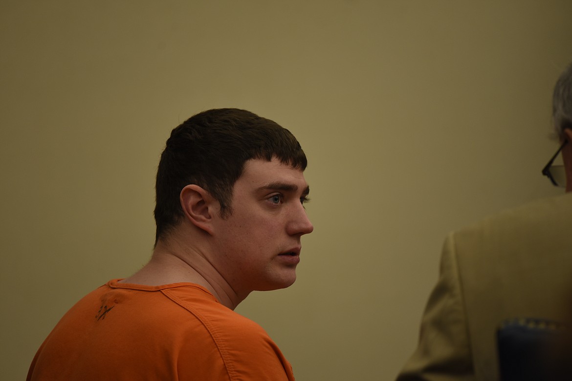 Zackary Matthew Maas, 26, speaks with his his defense attorney, Stephen Nardi, at his sentencing in Flathead County District Court on Thursday, May 11. A jury found Maas guilty of deliberate homicide in March. (Derrick Perkins/Daily Inter Lake)