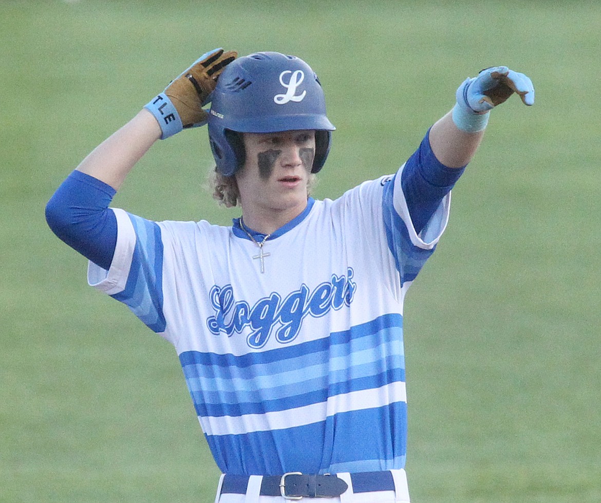 Libby Logger Cy Williams celebrates his stand-up double in the bottom of sixth inning vs. Kalispell AA Wednesday evening at Lee Gehring Field. Williams also hit a home run. (Paul Sievers/The Western News)