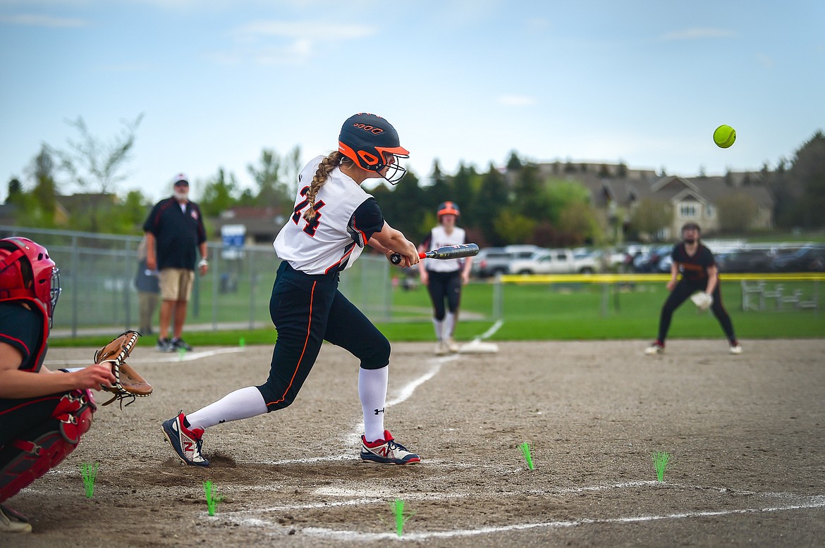 Flathead's Sawyer VanCampen (24) drives in a run in the third inning against Missoula Hellgate at Kidsports on Thursday, May 11. (Casey Kreider/Daily Inter Lake)