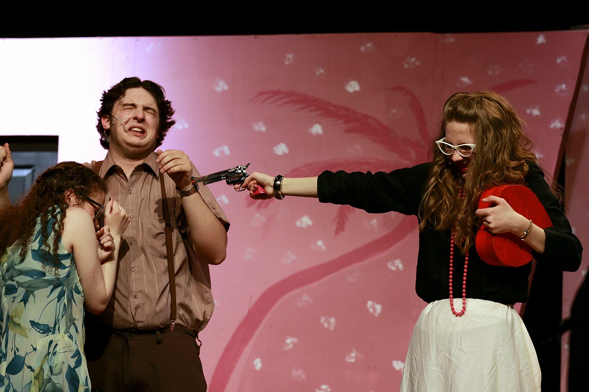 From left, Lake City High School students Ryleigh Broxson, Ben Crespo and Josie Lattin perform in "Lucky Stiff", a Troupe de Wolfe production of the 1988 off-Broadway play.