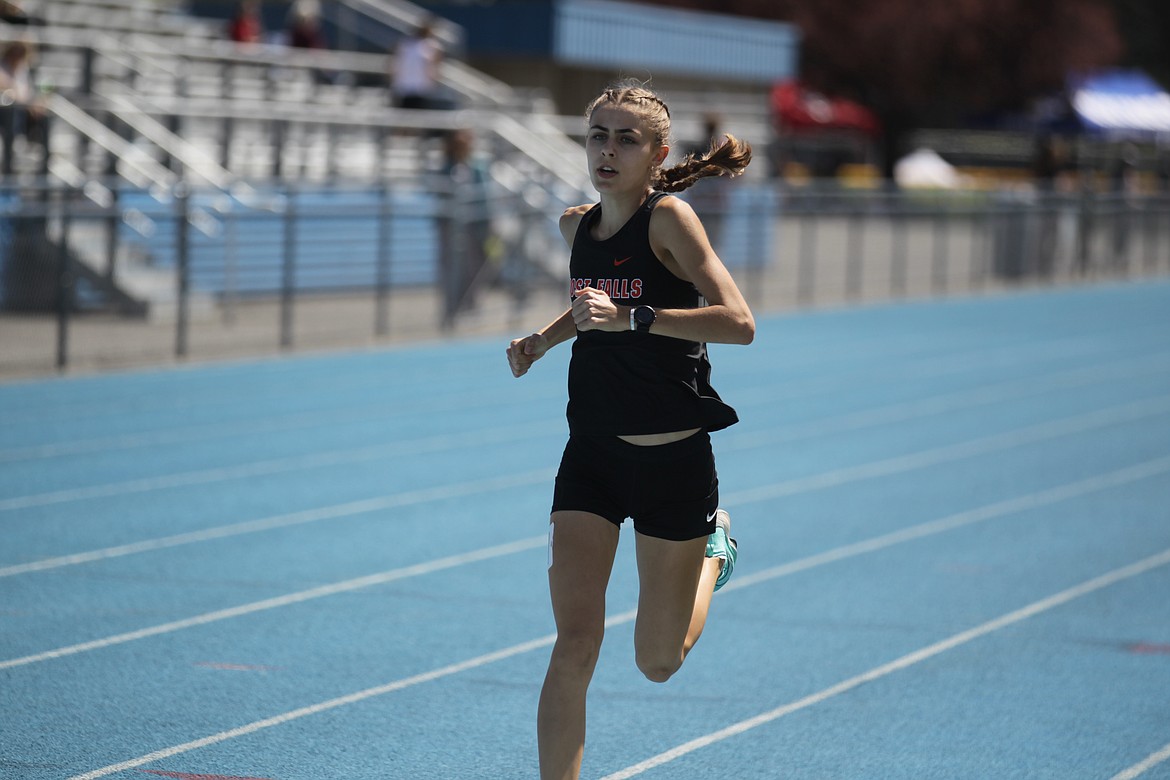 JASON ELLIOTT/Press
Post Falls senior Annastasia Peters completes another lap during the girls 3,200 run in the 5A Region 1 track and field meet at Coeur d'Alene High on Thursday. The meet continues today at Sweeney Track in Lewiston.