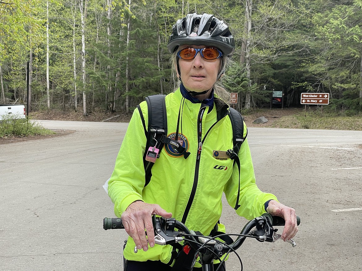 As a volunteer bike patroller at Glacier National Park, Lois Ladyn assists and educates cyclists about the wildlife and hazards present in the park during the spring months. (Adrian Knowler/Daily Inter Lake)