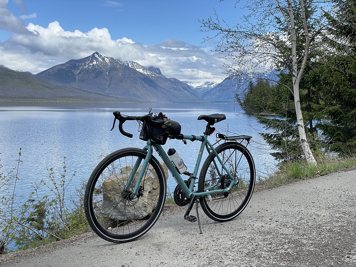 Cyclists are strongly encouraged to bring bear spray, plenty of water and food, and multiple layers of clothing as they take on Glacier National Park's Going-to-the-Sun Road in the spring. (Adrian Knowler/Daily Inter Lake)