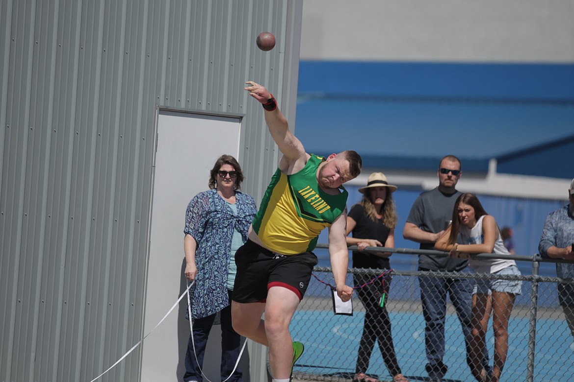 JASON ELLIOTT/Press
Lakeland High senior Preston Jeffs throws during the finals of the 4A boys shot put at the 4A Region 1 track and field meet at Coeur d'Alene High. Jeffs won the event with a throw of 48 feet, 9 3/4 inches.