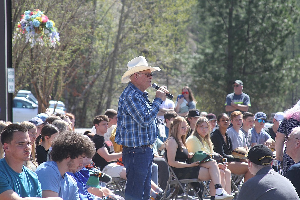 Country singer Ron Thompson delivers a stirring rendition of 'Victory in Jesus' to the crowd during the memorial ceremony for the 51st anniversary of the Sunshine Mine Disaster.