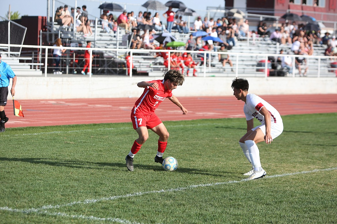 Othello junior Anthony Abundiz looks to get past a Grandview defender during the Huskies’ 3-2 win over the Greyhounds last week.