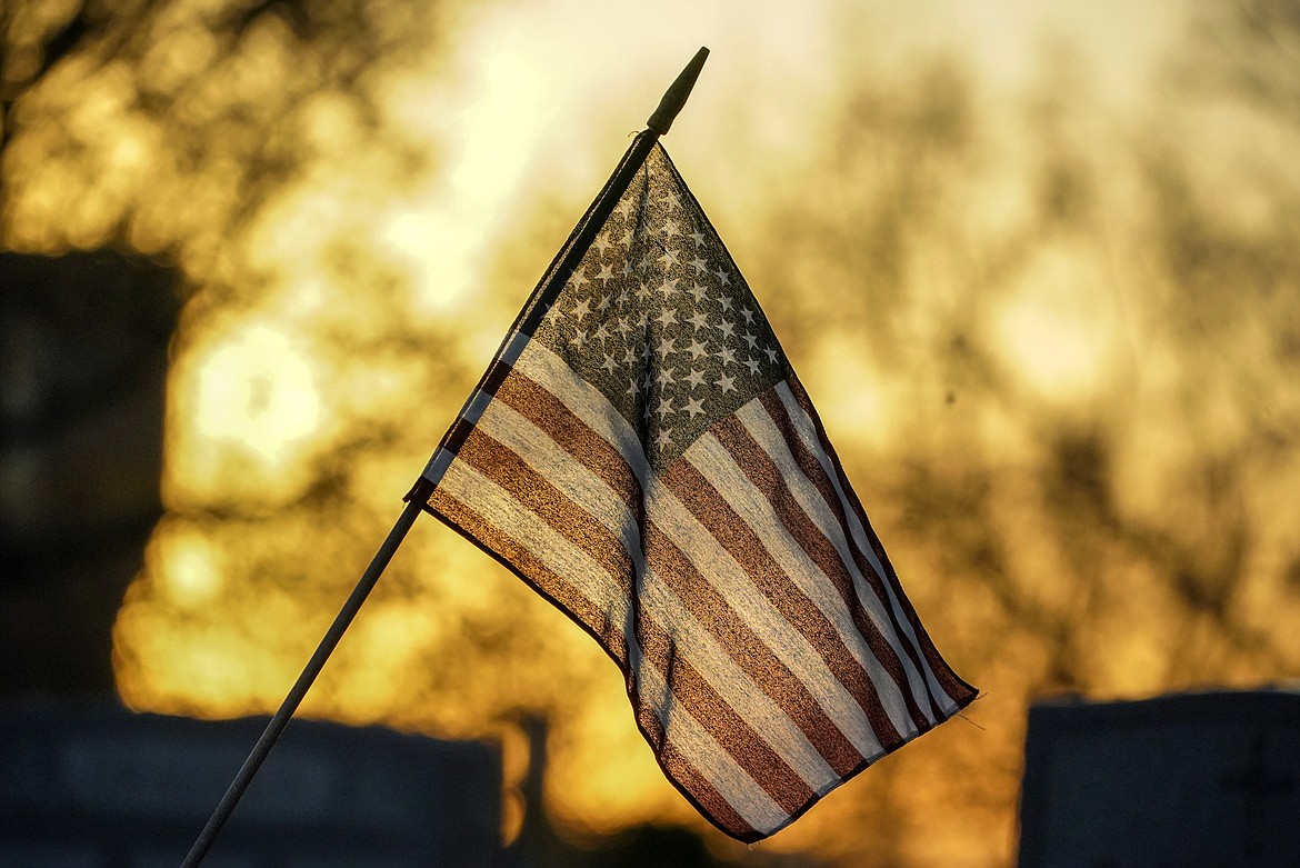 A flag at Mount Lebanon Cemetery in Mount Lebanon, Pa. (AP Photo/Gene J. Puskar FILE)